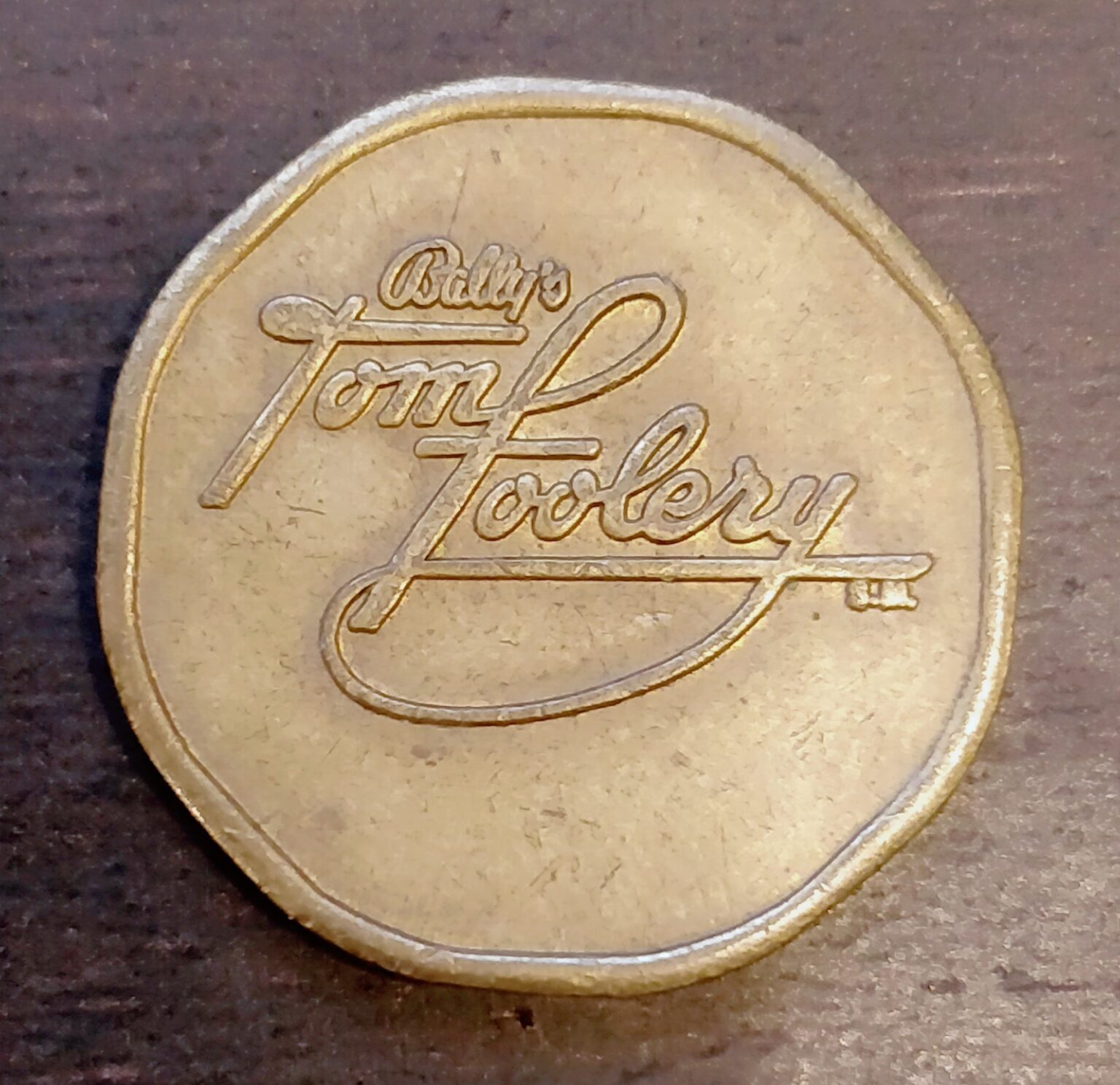 Bally's Tom Foolery token obverse
